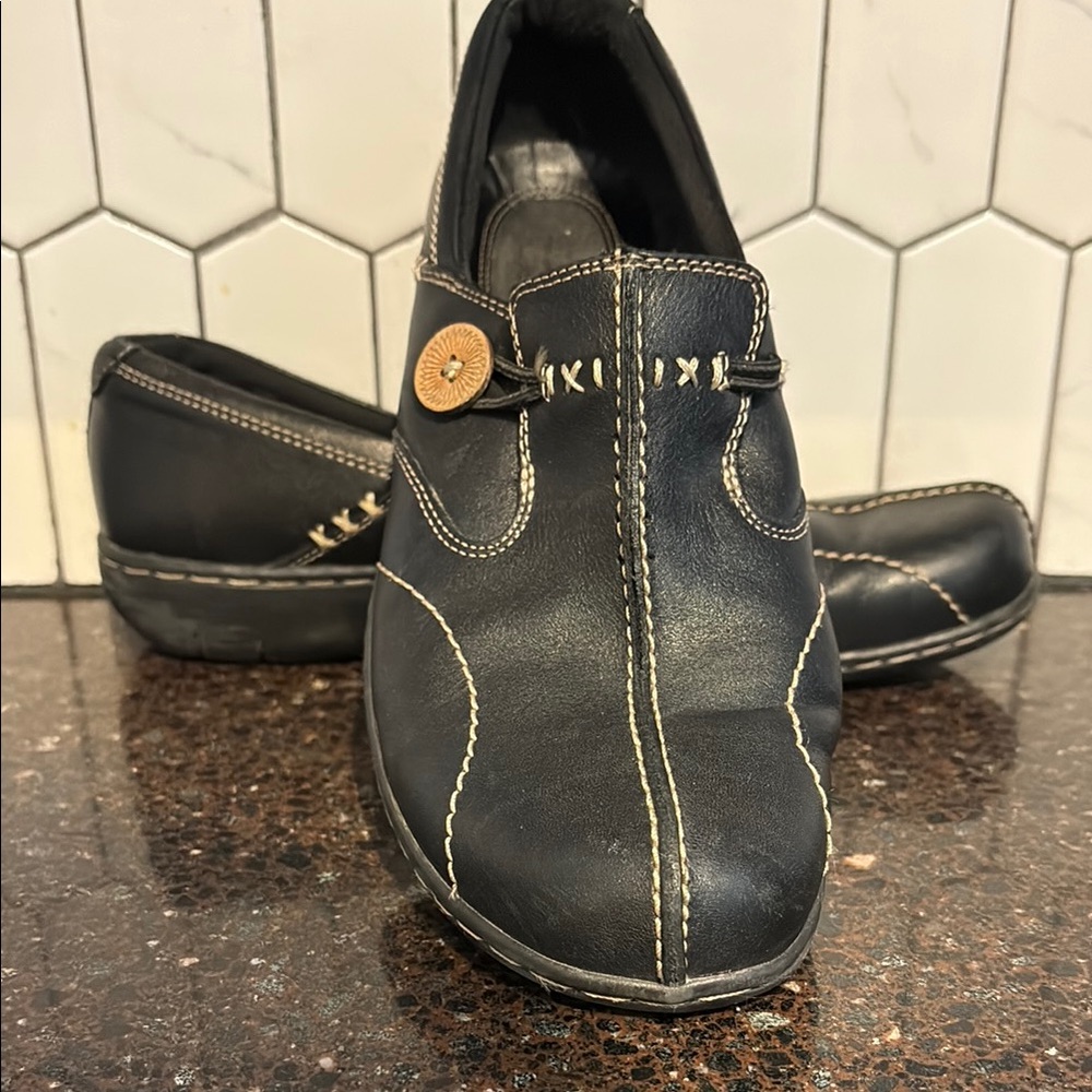 Clarks Women’s Unloop - Black Leather Loafers with Tan Stitching